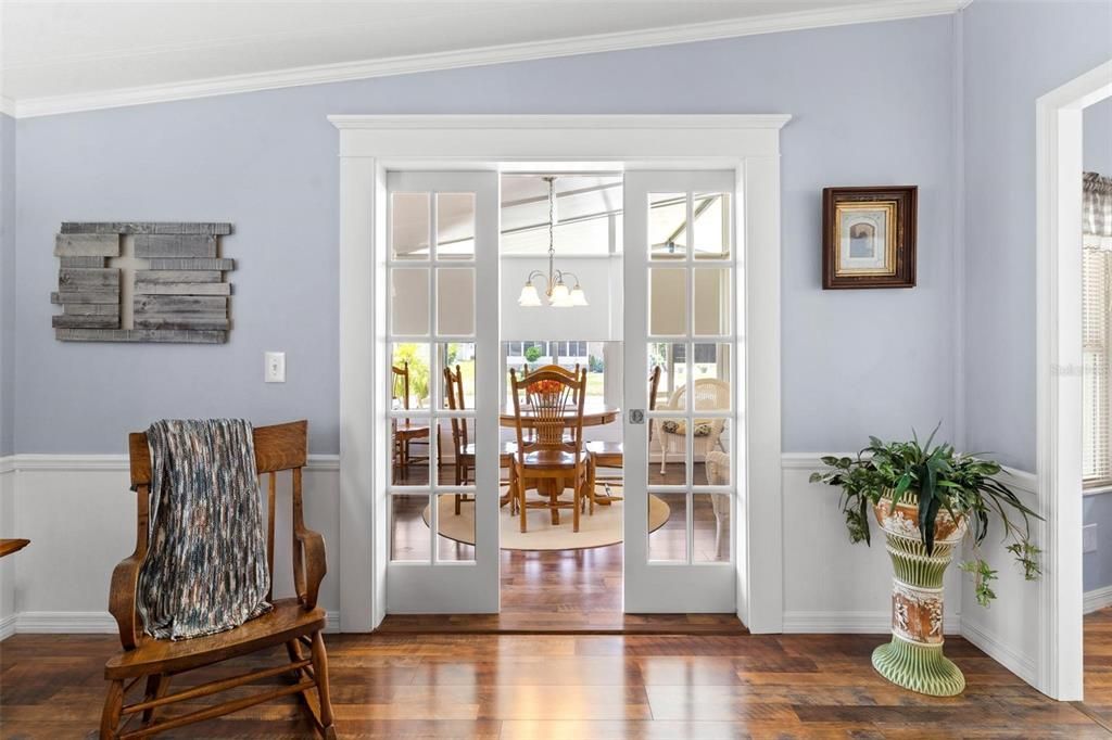 FRENCH/POCKET DOORS TO CLOSE OFF SUN ROOM/DINING AREA