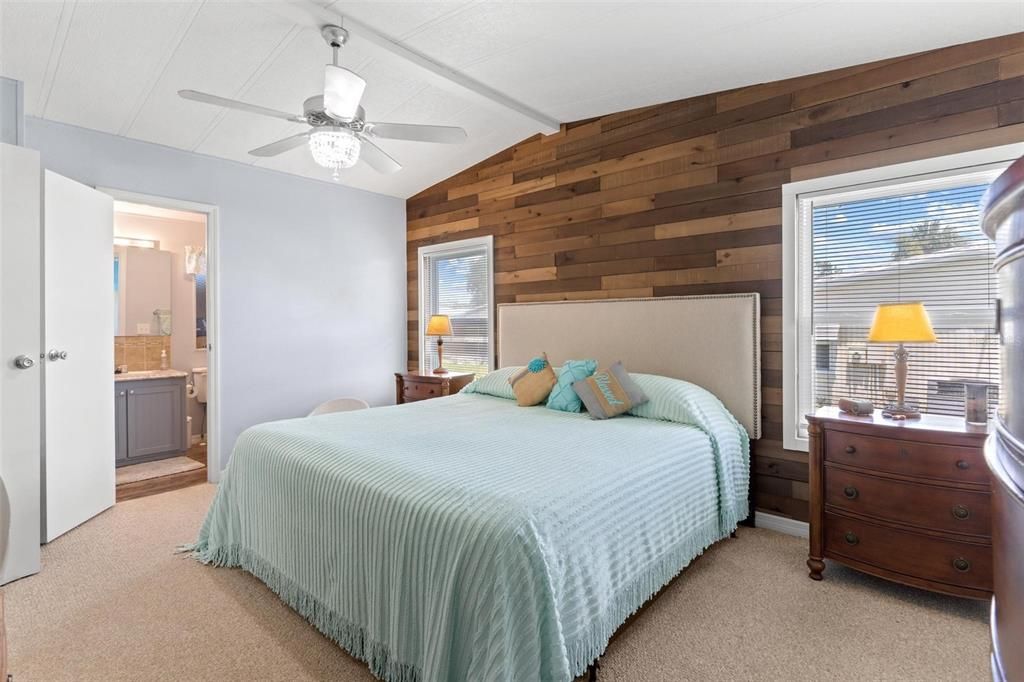 MASTER BEDROOM WITH CUSTOM WALL WOODEN FEATURE