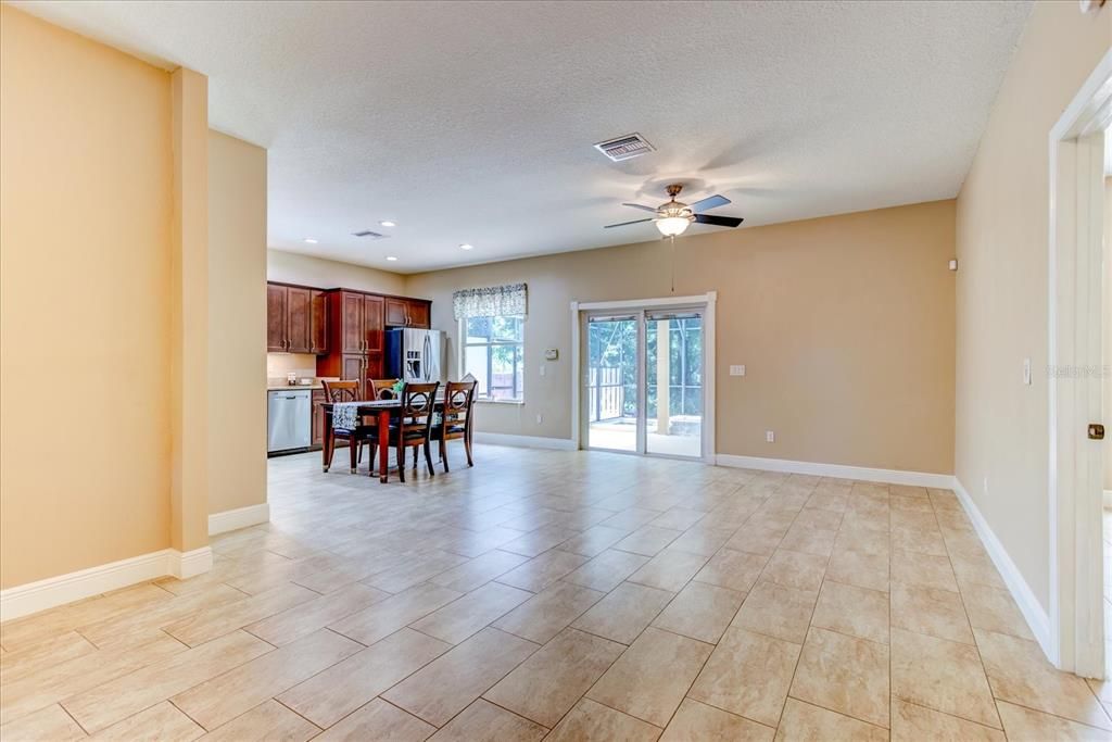 The kitchen opens up to the family and dining room