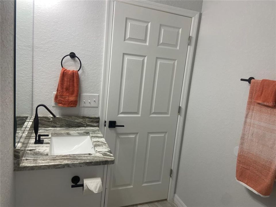 Hall bath with granite counter top