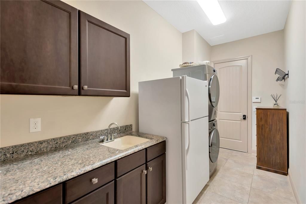 Laundry room leads to the 3 car garage