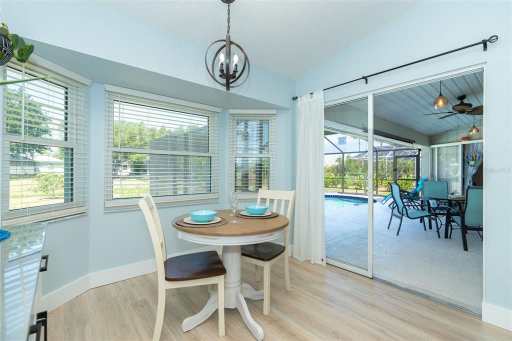 View of pool & lanai from kitchen