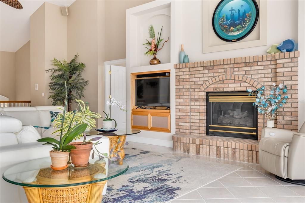 Built in entertainment area with fireplace