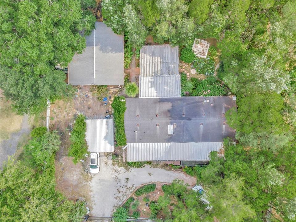 Aerial of home, carport and Garage with workshop