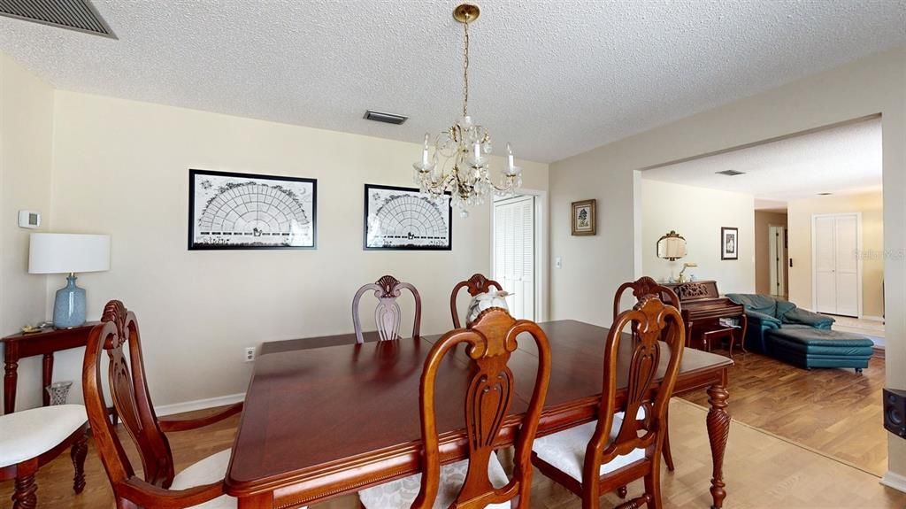 Dining Room with passage to kitchen, living room