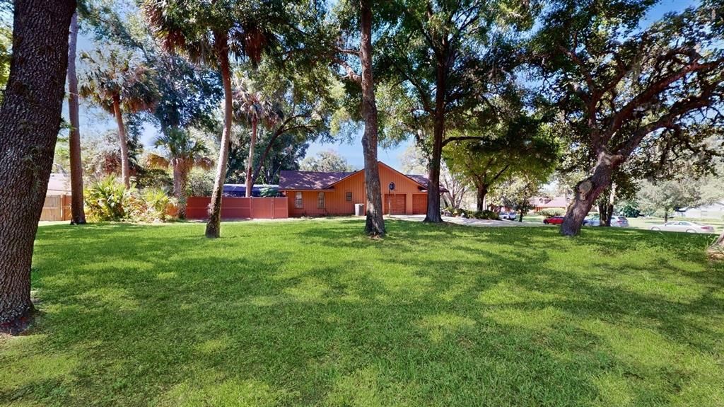 View of side yard from Archer's Point cul-de-sac