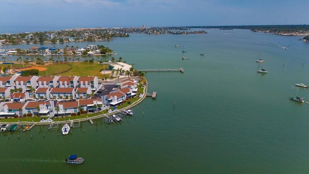 View of condo on end with boat slip in front