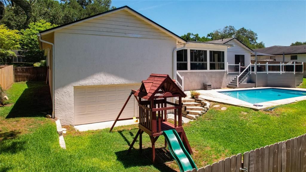 Private, fenced in yard with plenty of space and a huge storage area for all your toys.