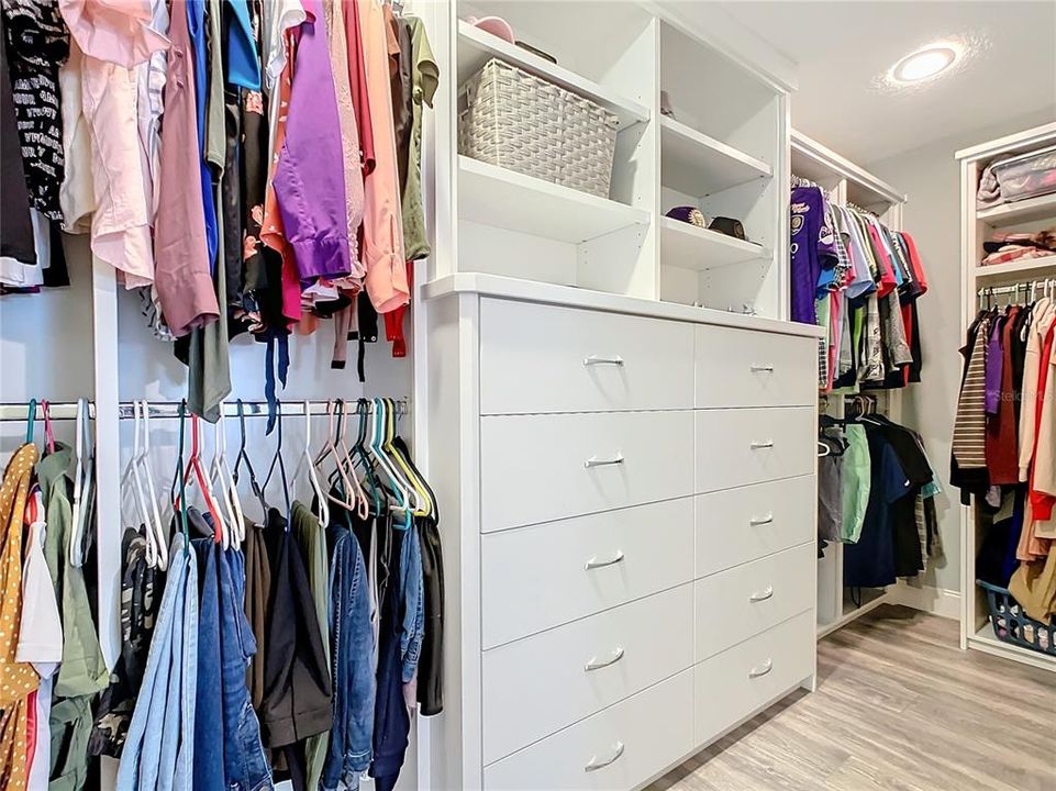 Built in storage in the huge walk in Primary bedroom closet