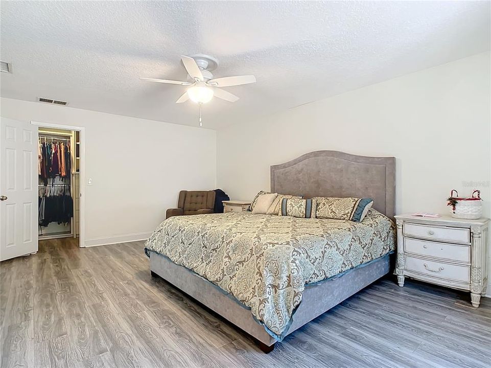 Primary bedroom with large walk in closet