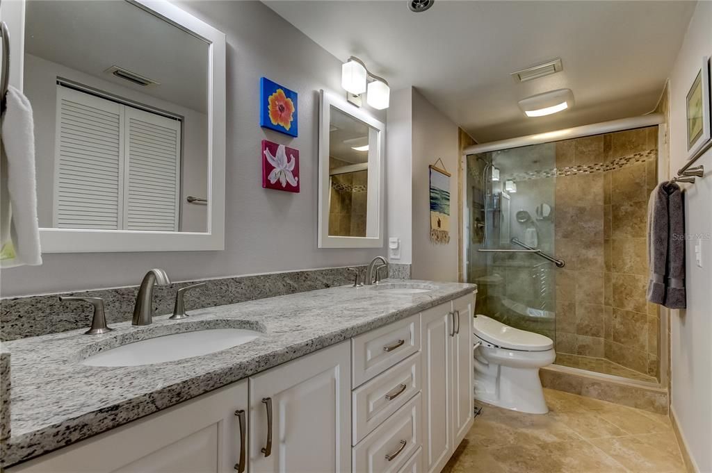 Primary Bath with large vanity area.  Granite counters with double sink