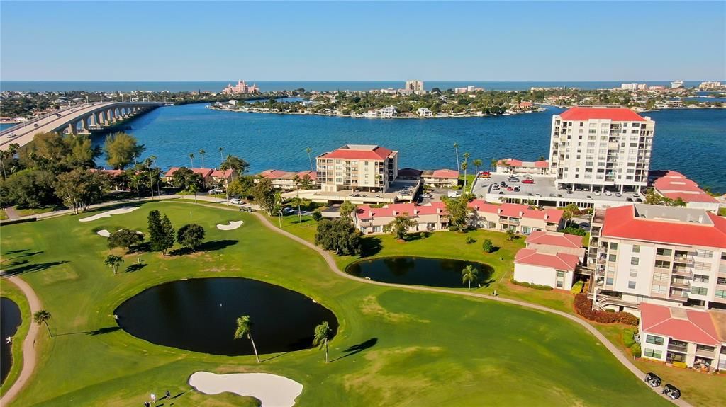 A golf course community surrounded by Boca Ciega Bay