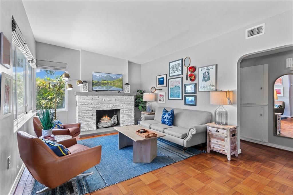 Family room features working fireplace.