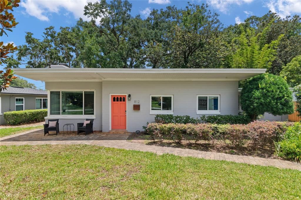 Front of home faces northwest. Front porch offers shaded area for enjoying morning coffee.