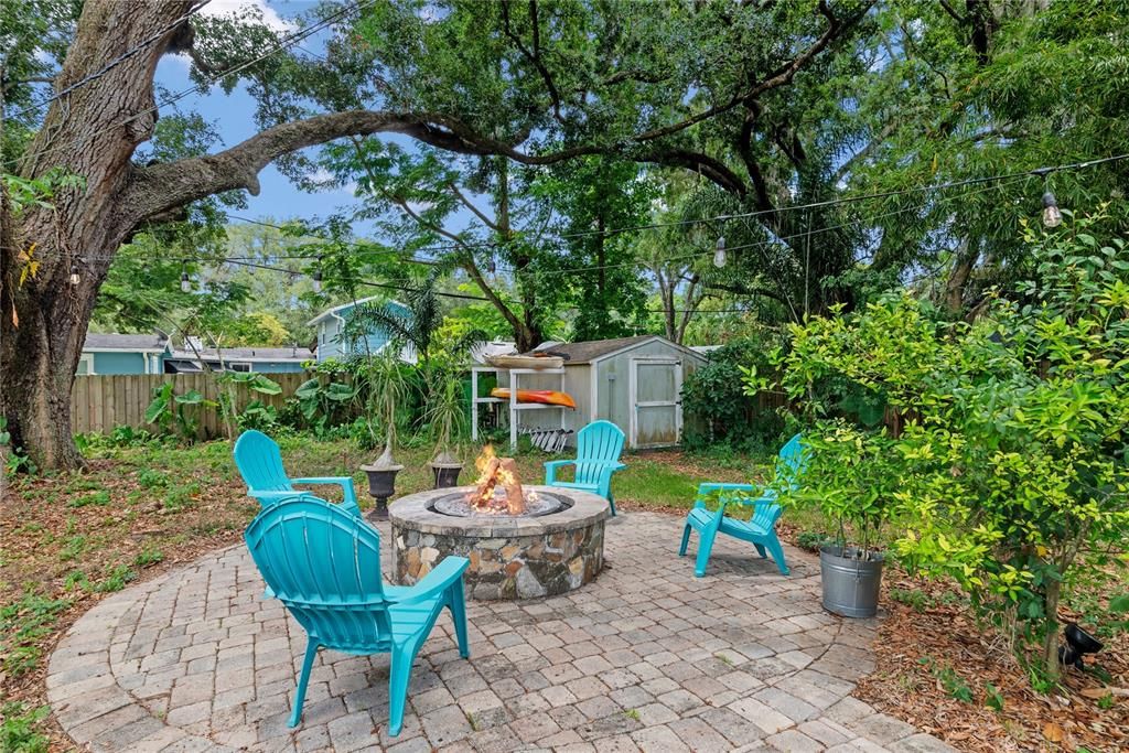 Fire pit area in the oversize backyard.