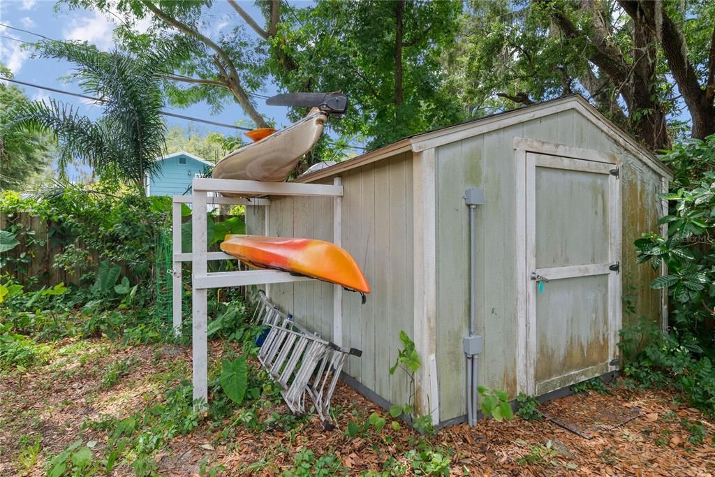 Large shed measures 10 x 14. Shed is wired with electricity and has overhead lighting.