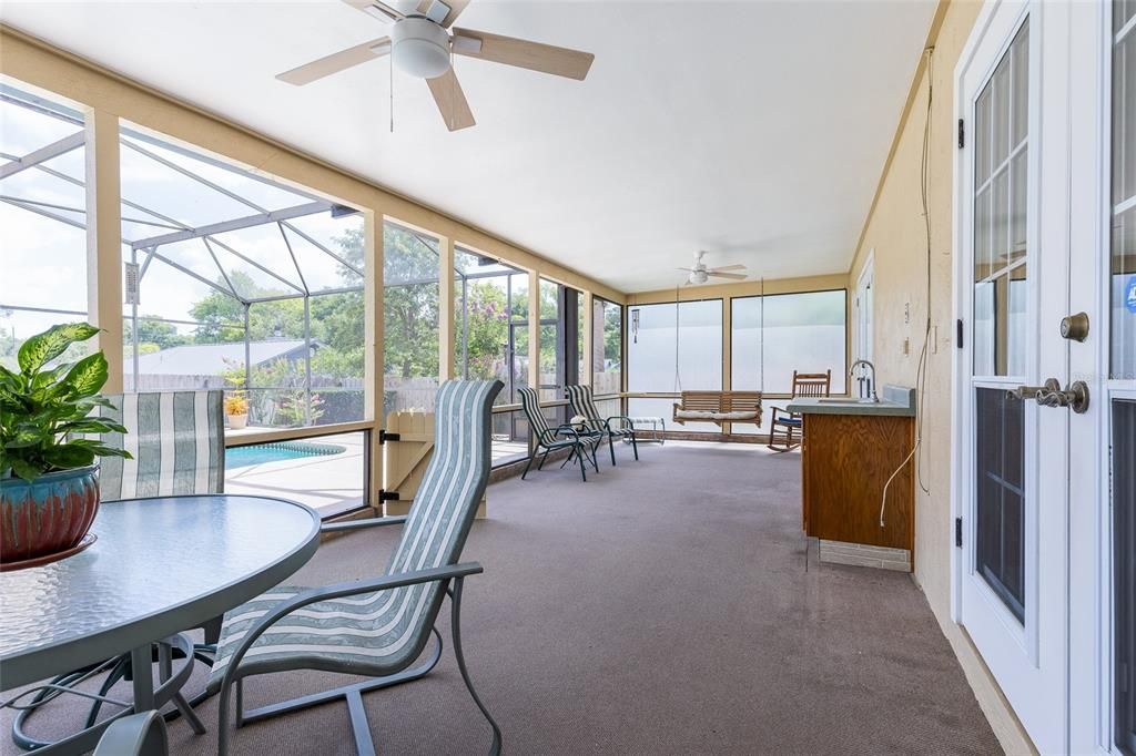 Carpeted Lanai with Wet  Bar Overlooking Pool