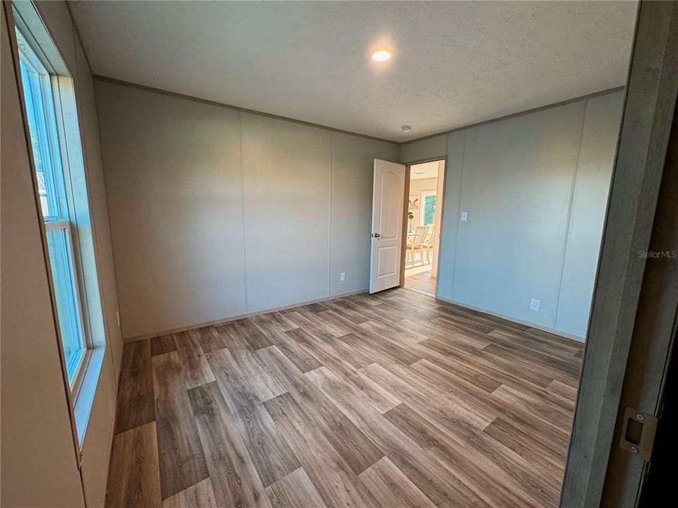 Bedroom 2**Disclosure** This photo is of the lot model. Inside of actual home is currently under construction. Home will be unfurnished.