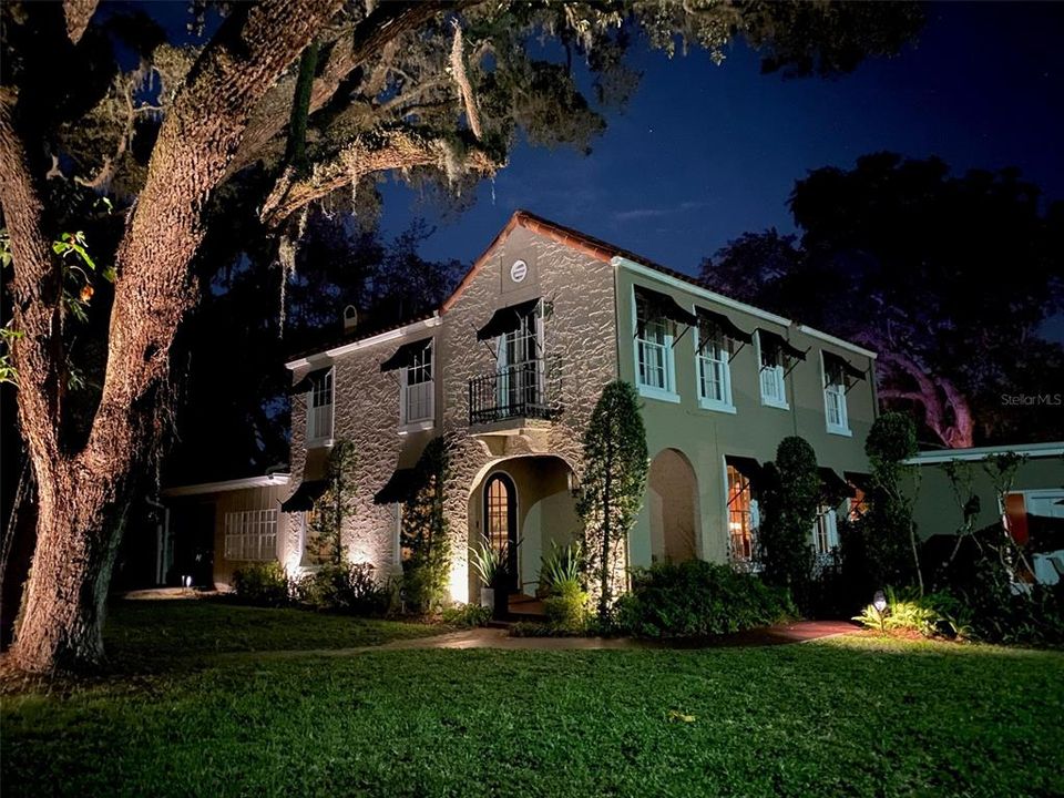 This Mediterranean Revival masterpiece is beautifully illuminated at night