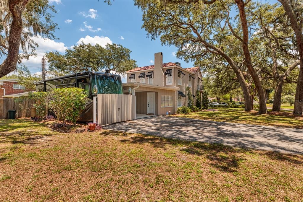 One of the modern features of this home is the enclosed RV port with 30 amp service.  High your boat, RV or other fancy toys