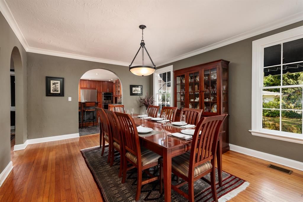 This formal dining room is much larger than was common for homes at the time.