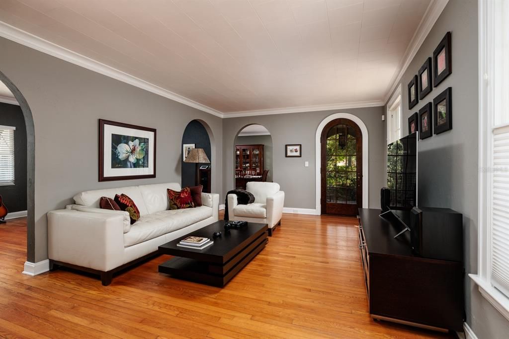 Spacious formal living room with lovely arched doorways