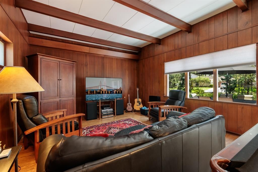 Family room with beautiful wood beam ceilings