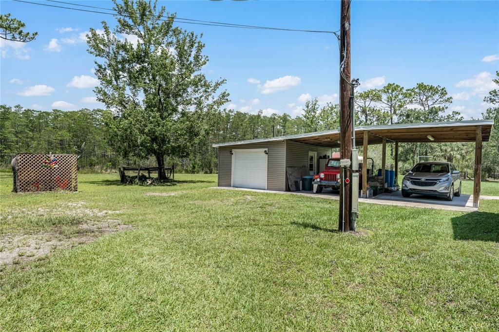 1 car garage and 2-car carport