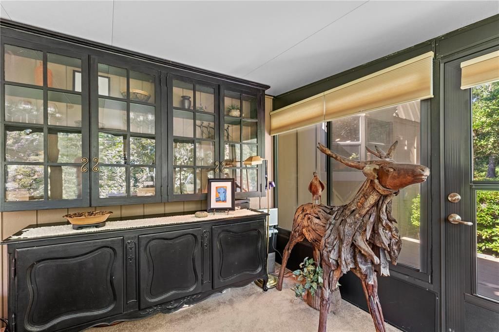 Enclosed porch with buit in cabinets