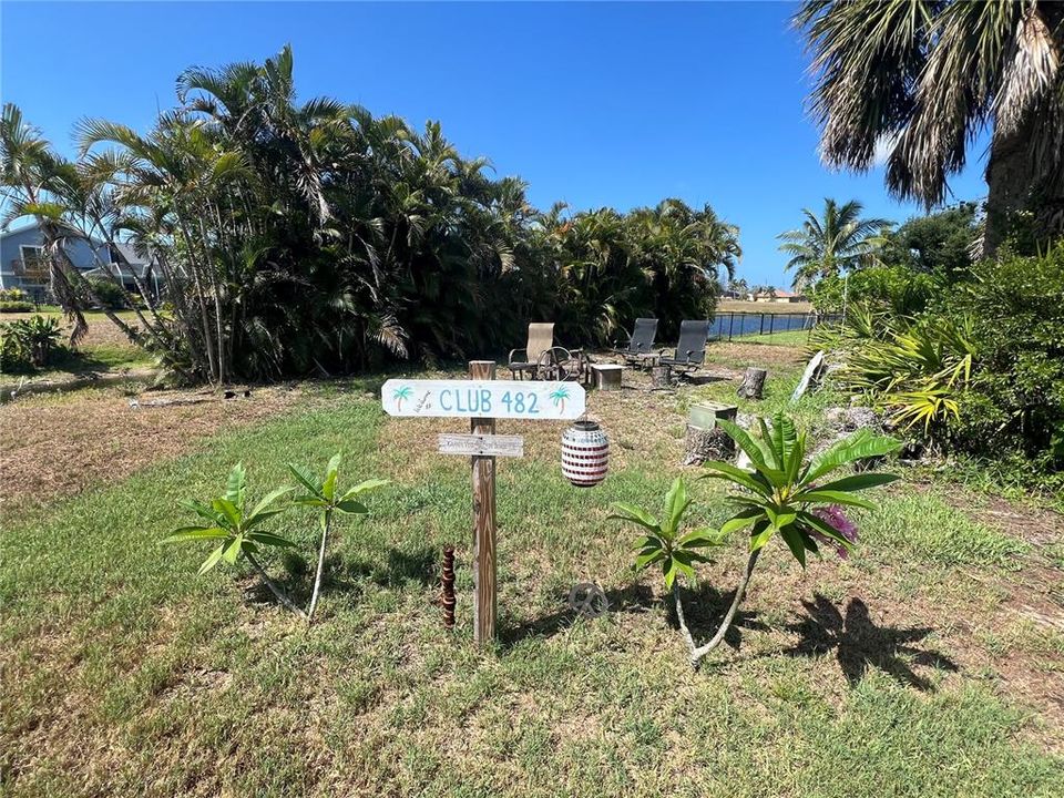 Gorgeous mature areca palms line the rear of this oversized .33 acre property!