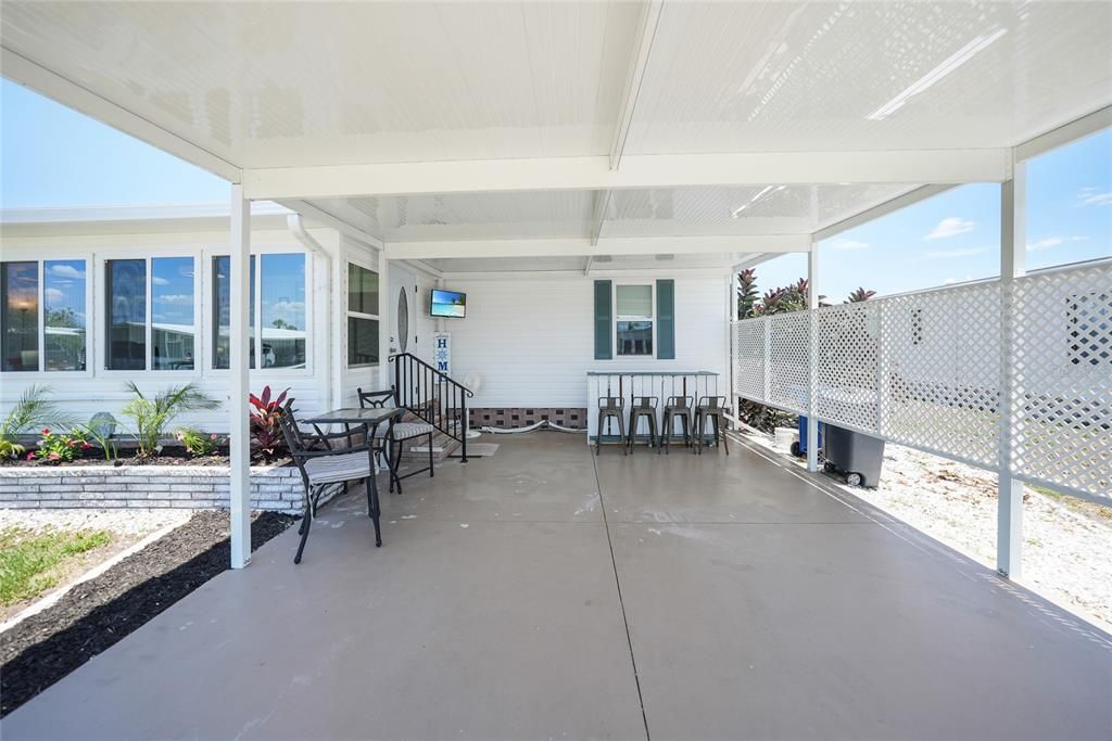 brand new carport with bar and tv