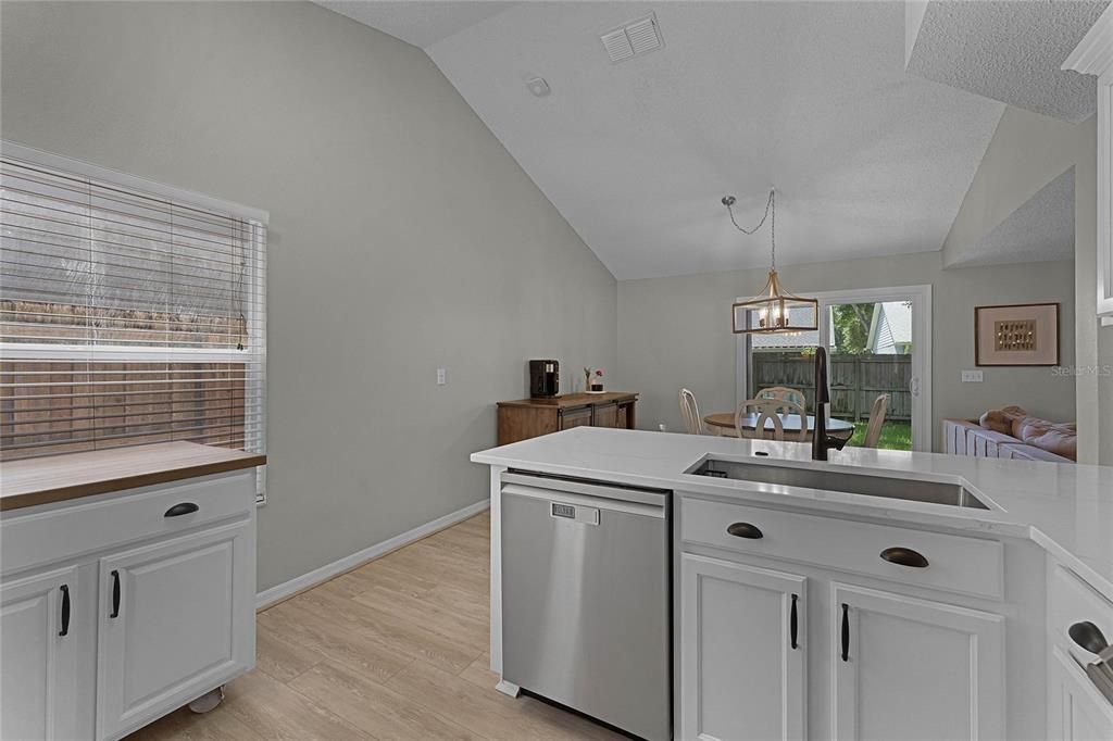 Kitchen has moveable custom island with butcher block top!