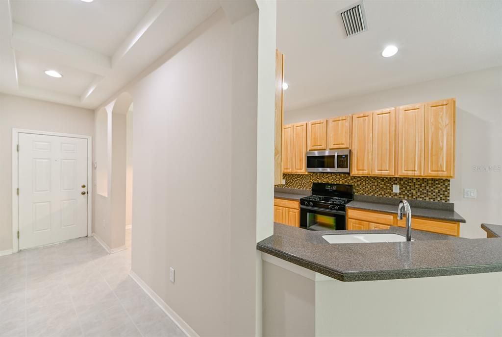 Front Door and Kitchen