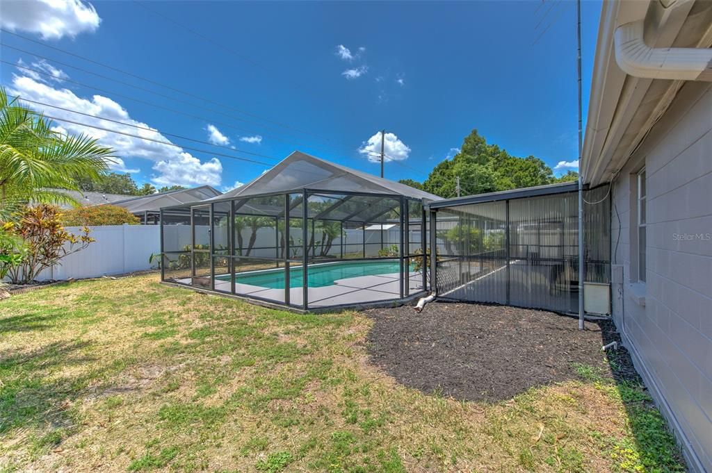 Screened in Pool with fenced backyard & landscaping