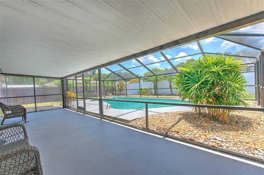 View of large pool from covered patio