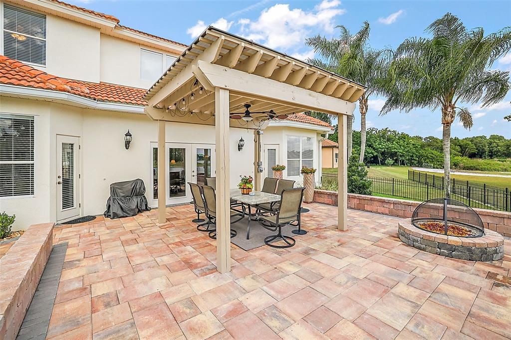 Formal Dining with Savannah shutters views the front fountain.