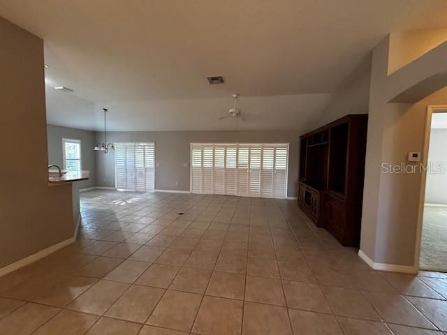 As you walk into this Lantana model, this beautiful open floor plan leads you to the enlarged Lanai with the view of the #8 hole at Ashley Meadows golf course