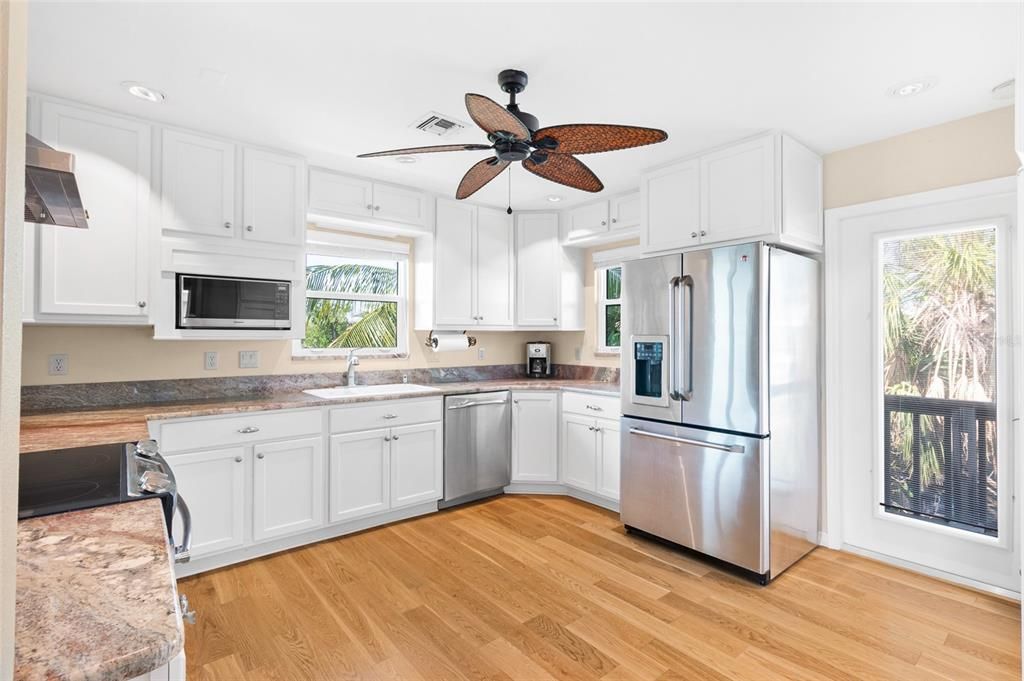 Kitchen including granite counter tops and stainless steel appliances!