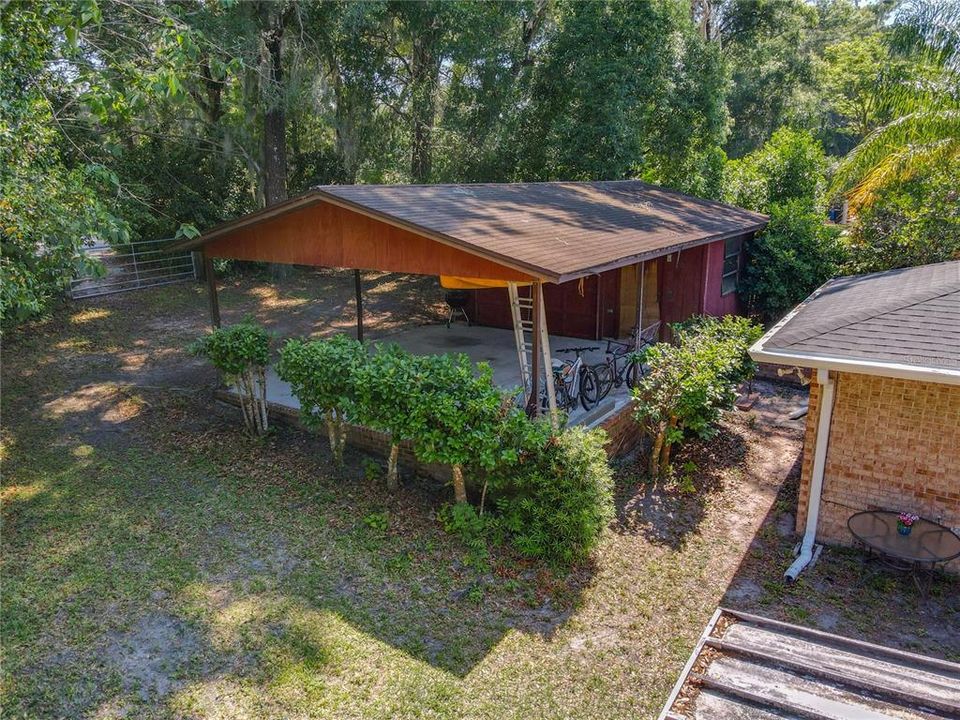 Aerial of carport and back yard