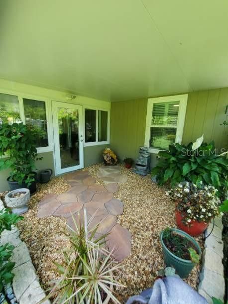 Right Side of Sunroom with Butterfly Garden