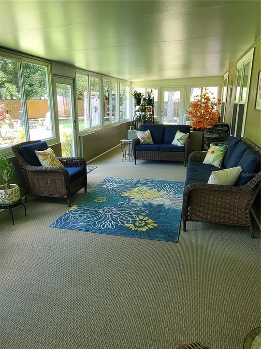 Enclosed Sunroom with three doors