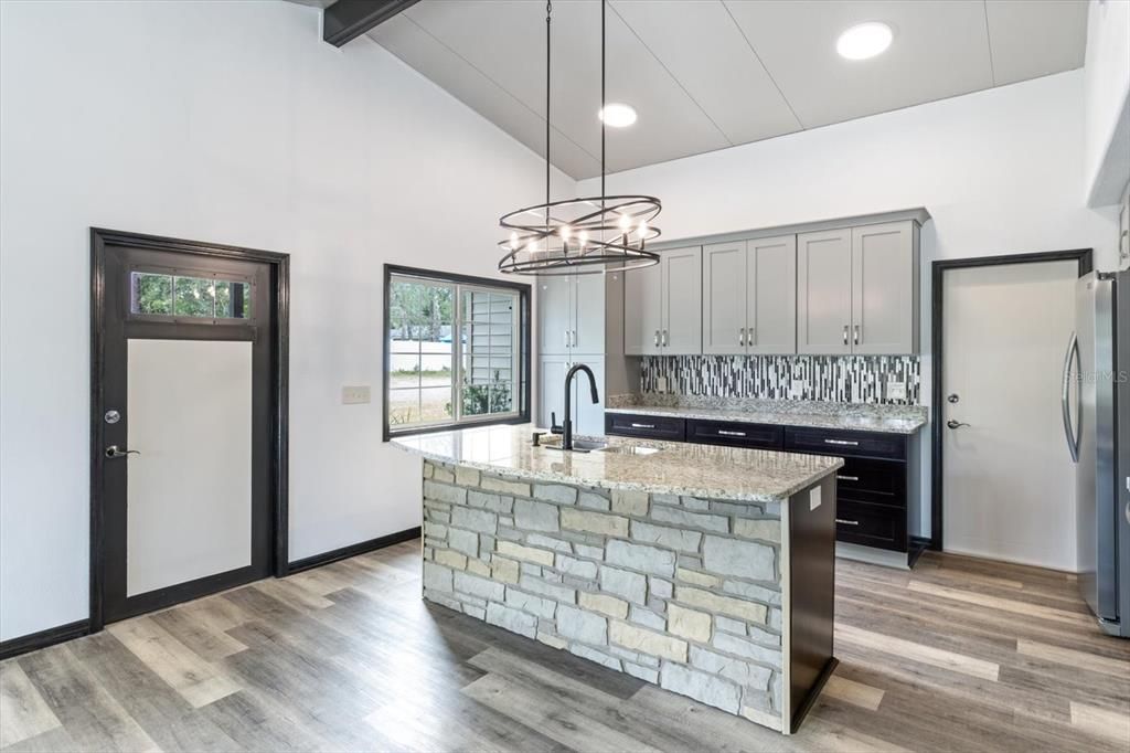 Granite Countertops with Mosaic Backsplash