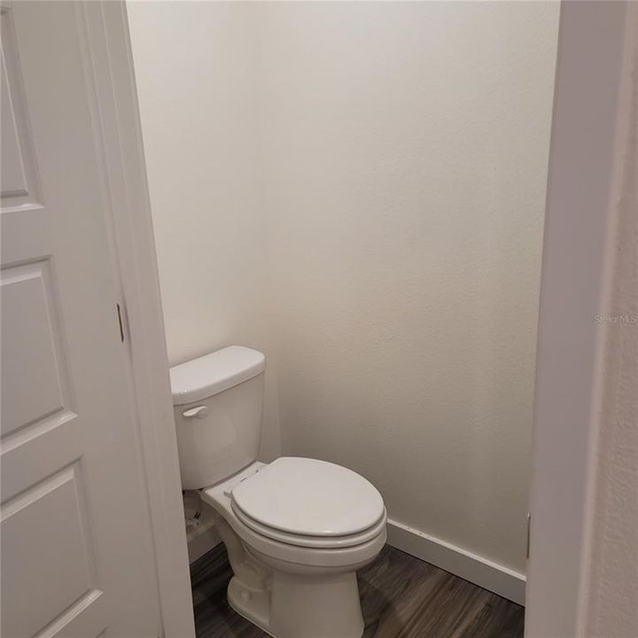 Private toilet in the master bath