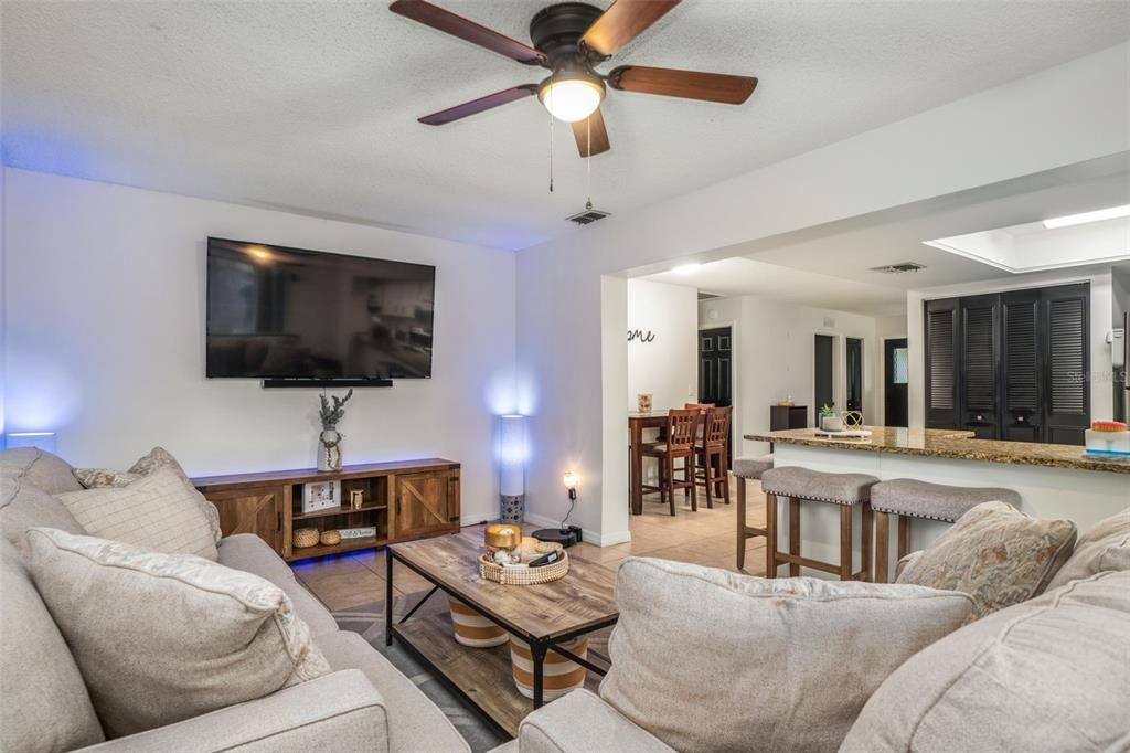 Living room- view of kitchen/dining area