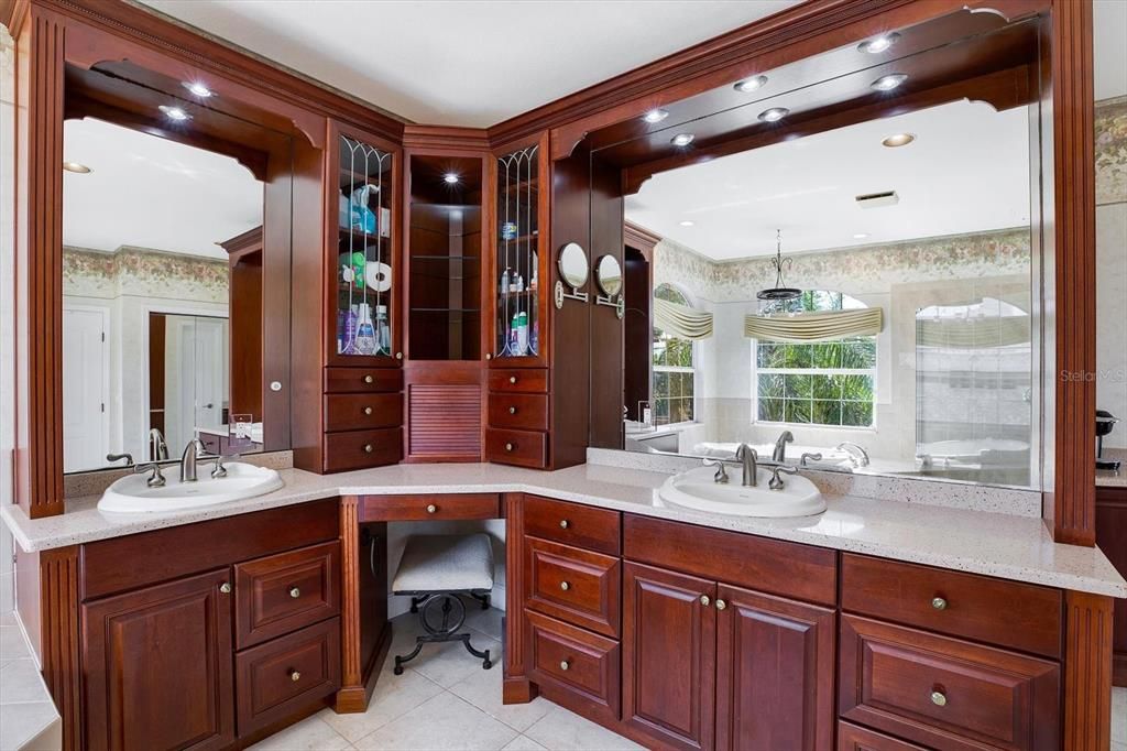 Upscale built-in cabinetry offers space and places for all of your toiletries