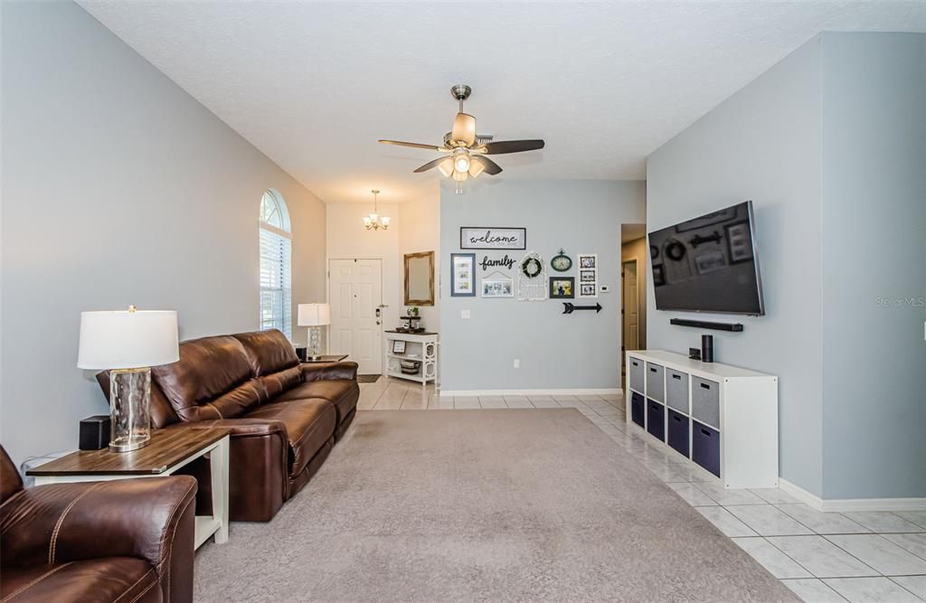 Extra large living space! view if from sliding doors leading to enclosed porch