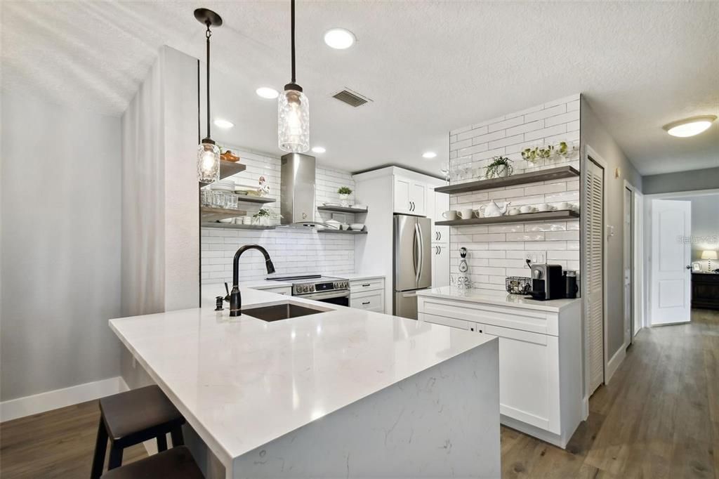 Kitchen reconfigured to enhance the space