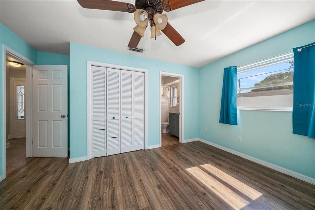 Primary closet and en-suite bathroom