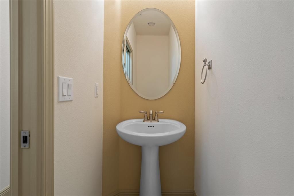 Half Bath located between the two bedrooms. Perfect for your guests.