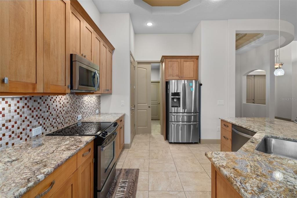 View two of the Kitchen. The kitchen drawers do have custom pull out drawers